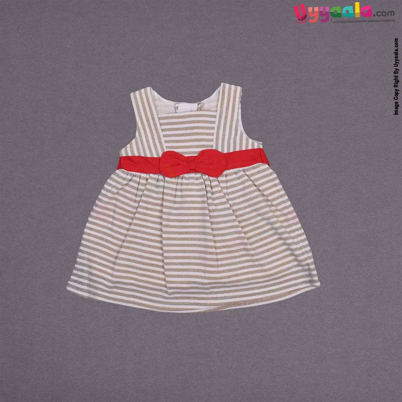 YELLOW DUCK Cotton sleeveless party wear frock for baby girl with bow applique- Cream with golden stripes