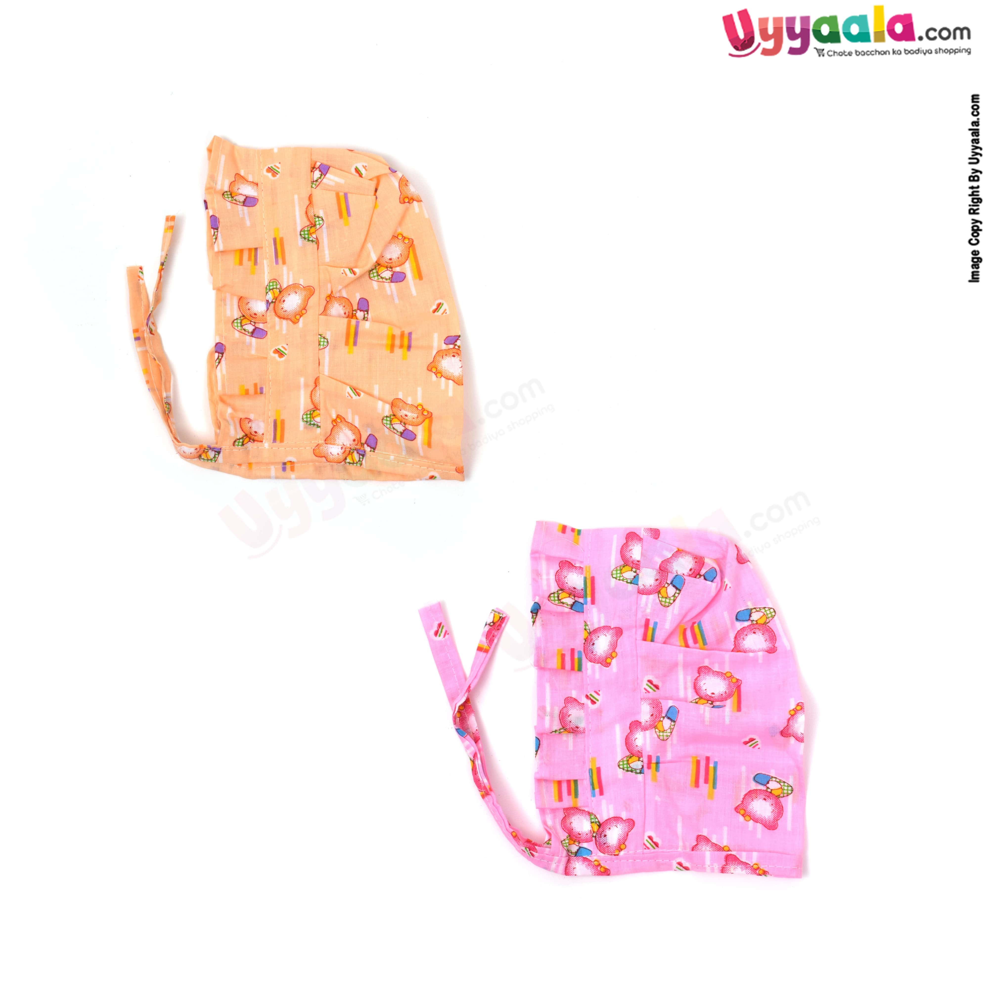 Baby tying cotton caps with teddy bear print